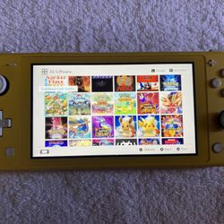 NINTENDO SWITCH LITE + 50 SWITCH GAMES and 7500 RETRO GAMES