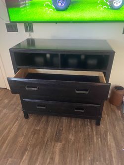Tall dark brown/black dresser