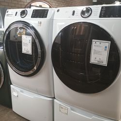 LG SET WASHER AND DRYER FRONT LOAD, WITH PEDESTALS