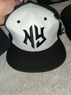 NY cap