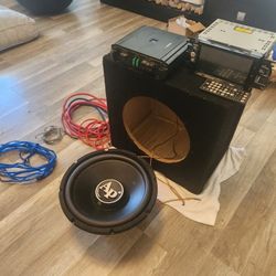 Car Subwoofer, Amplifier, And Stereo With Wiriing.