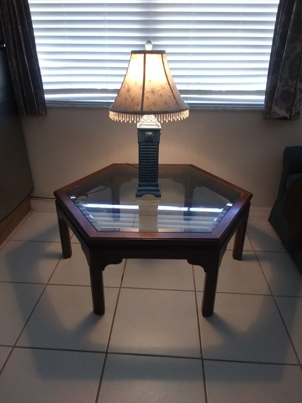 table and lamp has a small light inside as you can see in the photo 43x43 height 17