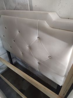 White single bed and frame