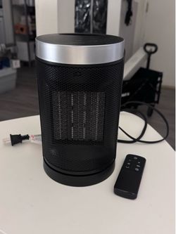 Oscillating space heater with remote