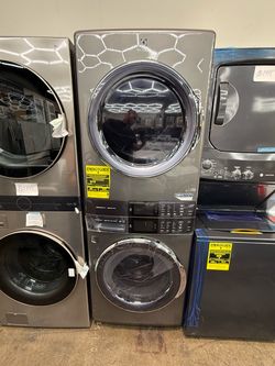 Brand new Electrolux 4.5 cu. ft. Stacked Washer and 8.0 cu. ft. Gas Dryer Laundry Tower in Titanium with SmartBoost Premixing, Energy Star