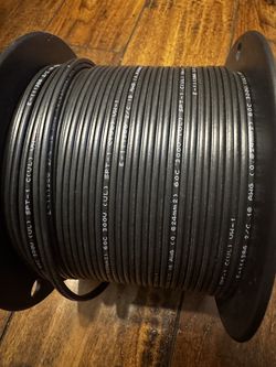 Product Listing: 250ft Spool of 18 AWG 2-Conductor Stranded SPT-1 Lamp Cord (Black) Product Overview This premium 250-foot spool of 18 AWG 2-conductor