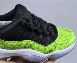 Air Jordan 11 Low Green Snakeskin Sneakers
