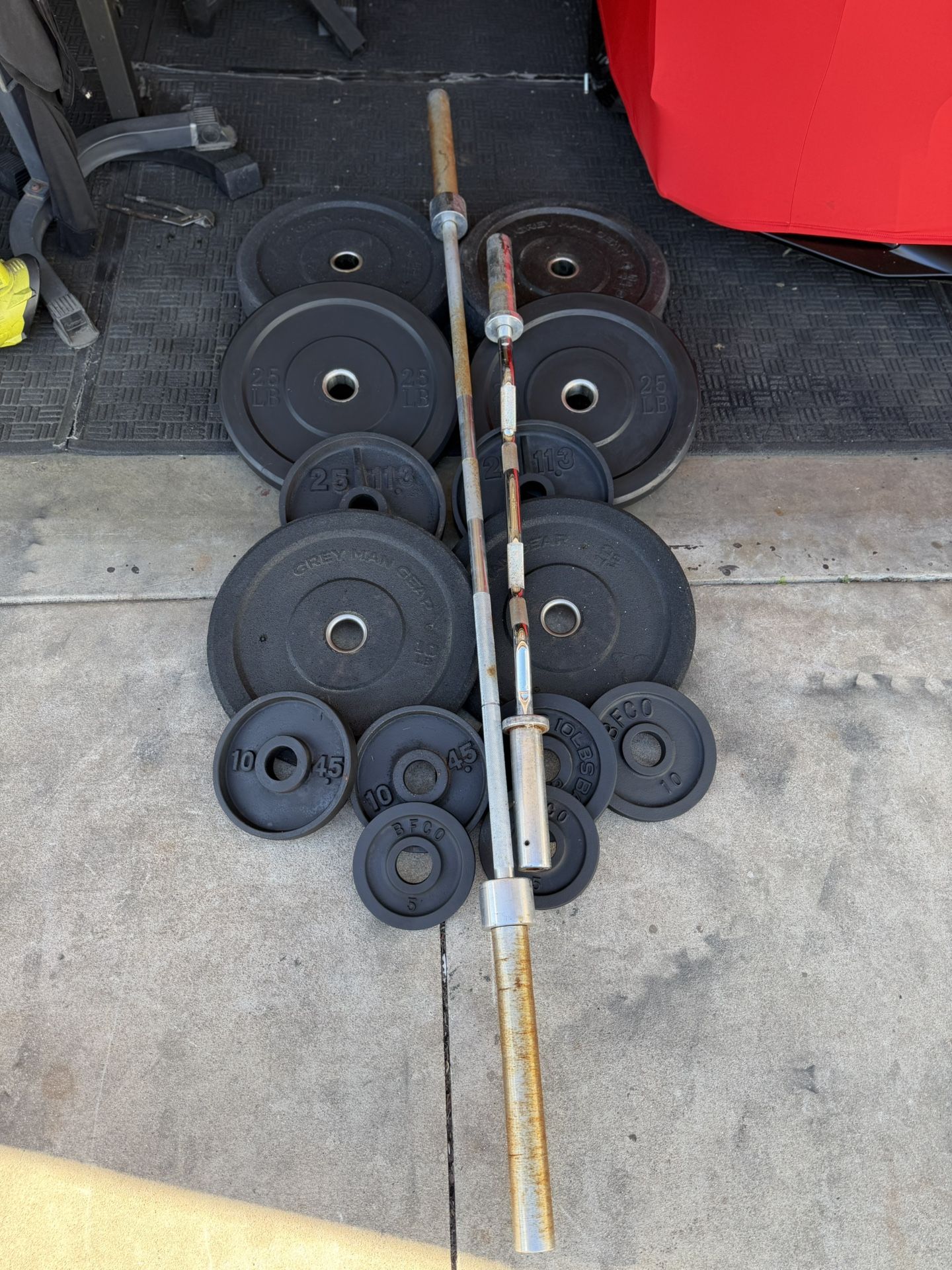 Olympic weight plates 260lbs plus 45lb bar and curl bar