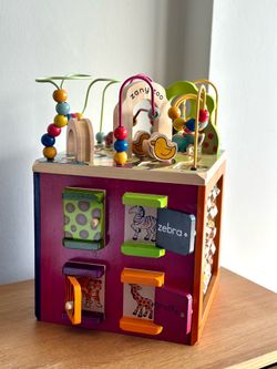 B. toys Zany Zoo Wooden Activity Cube