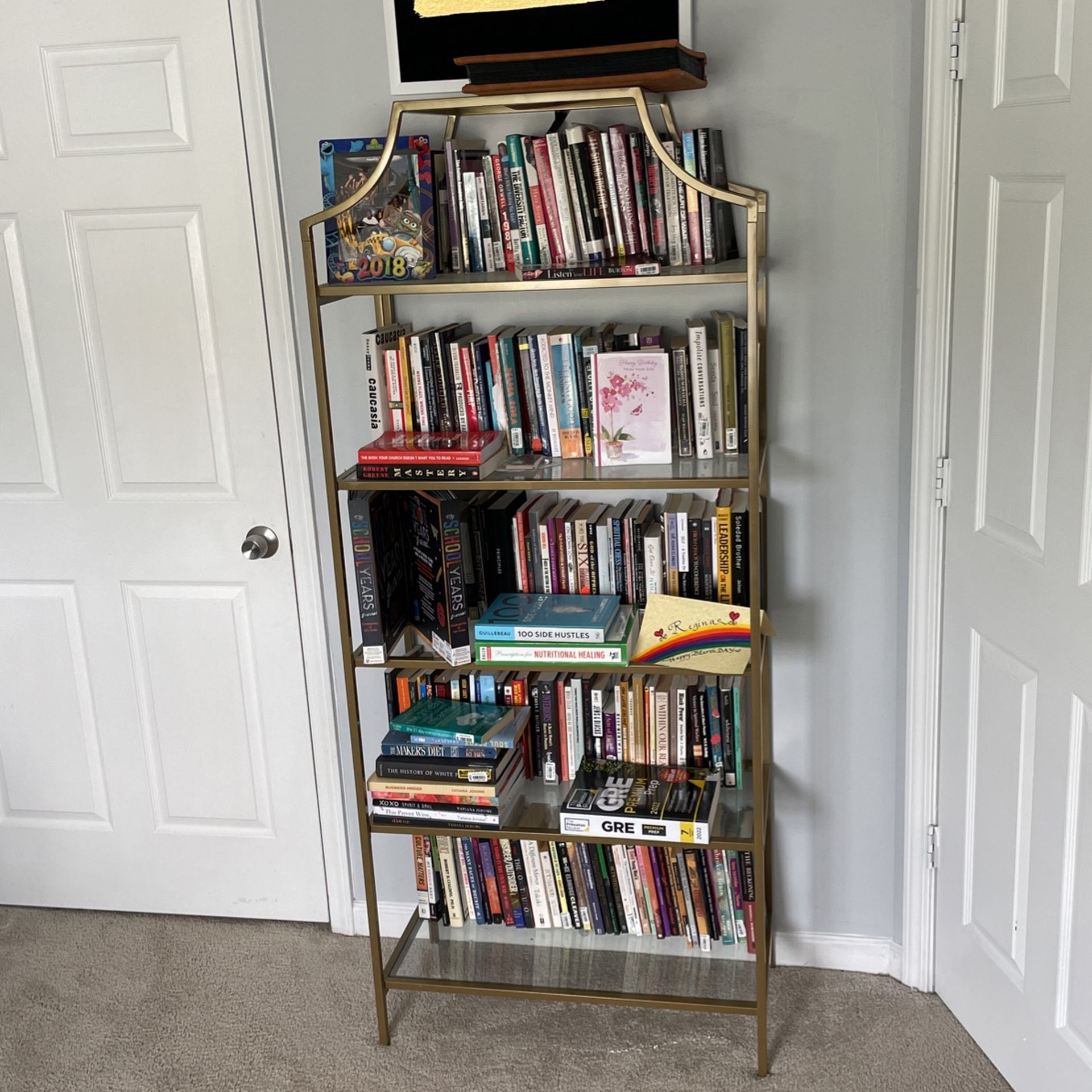 Gold bookshelf 
