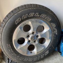 Jeep Wrangler Stock 18in rim and tire