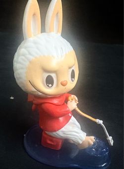 POP MART Labubu figure from the Monsters Coca-Cola Series,  "Look What I Found" model