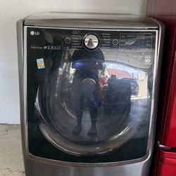 Grey- LG, a 5.2 cu. ft. large capacity, smart, Wi-Fi enabled front load washer.