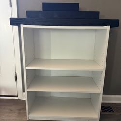 Small bookcase and floating shelves