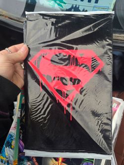 factory-sealed black polybag edition of Superman #75