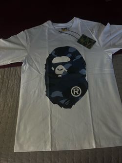 white and navy blue bape shirt size: M