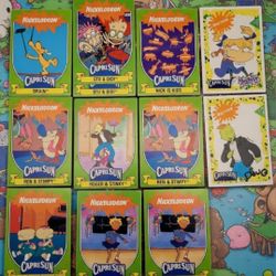 (Lot Of 12) 1991-92 Nickelodeon Capri Sun Rugrats/Doug/Ren Stimpy Cards & Decals. 
These are vintage 1 Capri Sun Nickelodeon promotion trading