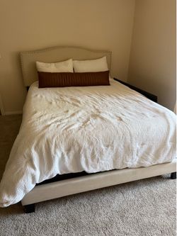 Bed Frame — $100 OBO  Simple bed frame in good condition.  Structurally solid Normal wear Easy pickup