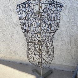 Antique dress form.
