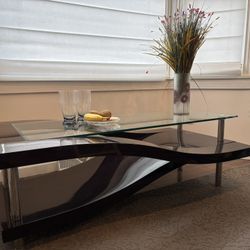 Modern Glass Coffee Table w/ Curved Wood Base & Chrome Legs – Stylish
