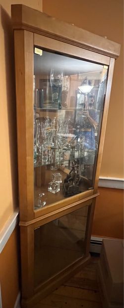 Two curio cabinets