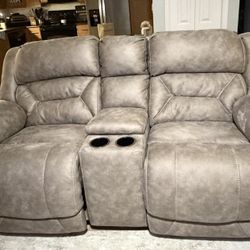 Power Loveseat Recliner w/head/lumbar/feet controls. Less than 1 yr old, rarely sat on (only a couple times)