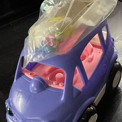 Fisher Price Little People Purple Van 2006 with mom, baby stroller and batteries