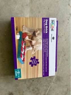 Outward hound by Nina ottoson dog brick puzzle