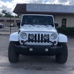 2012 Jeep Wrangler Unlimited Sahara AWD 