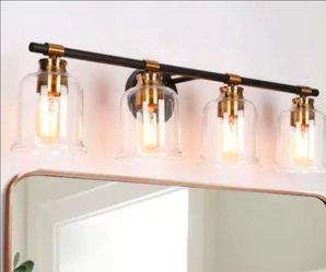 LNC Chayote 29 in 4-Light Black Bathroom Vanity Light Wall Sconce with Plated Brass Accents and Bell Clear Glass Shades