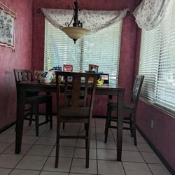 4 High Top Chairs With Table  
