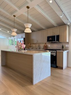 Modern Oak White Oak Kitchen Cabinets + Taj Mahal Quartz Countertops