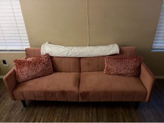 Pink couch / bed