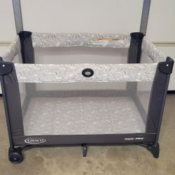 Practically New Graco Baby Playpen ( Used Once). Price Firm!