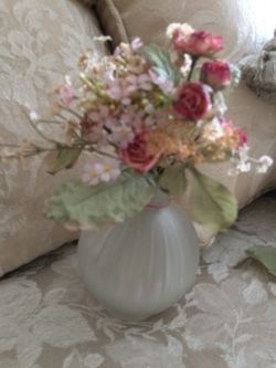 Small flowers in glass vase