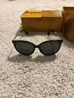 Gucci Black Cat-Eye Sunglasses with Gold Arms