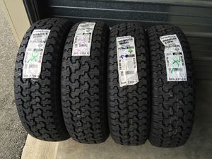 Photo New 235/75/15 Goodyear wrangler A/T tires