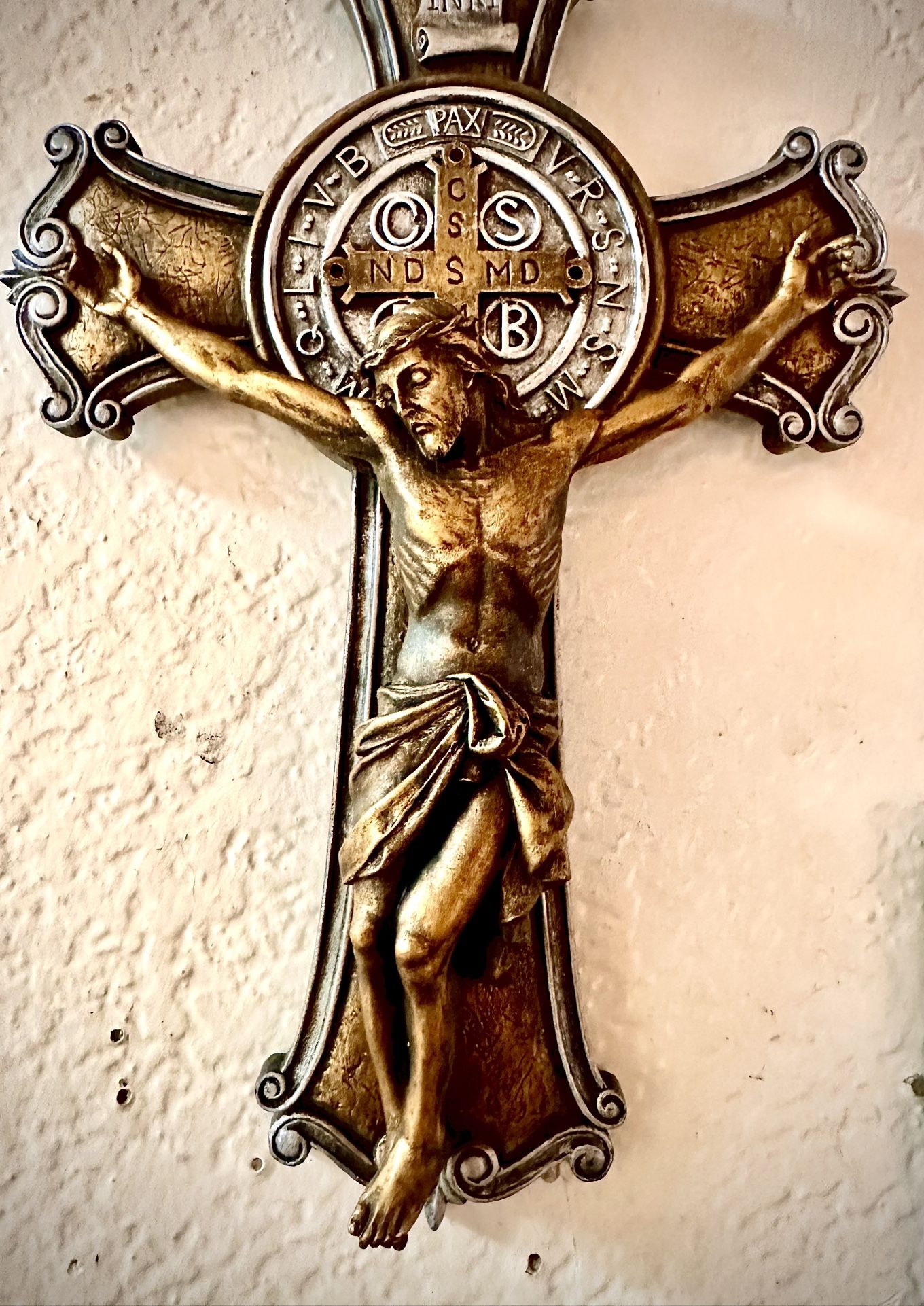Beautiful Crucifix with Jesus sculpture with dimensions H10xL6.5xD1.5 inch Lbs 0.8. This is a quality solid composite resin sculpture in excellent lik
