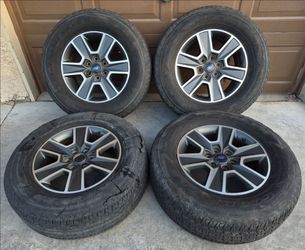 OEM Ford Rims and Tires 18" 6x135