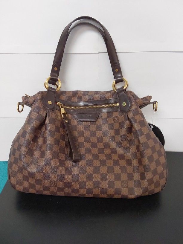 Louis Vuitton "Evora" Crossbody Bag