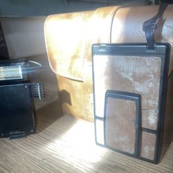 Polaroid SX-70 Land Camera Model 3 with a brown leather case