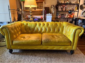 Unique yellow leather Chesterfield loveseat/sofa with black nickel nailhead trim