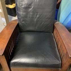 Wooden rocking chair with cushions