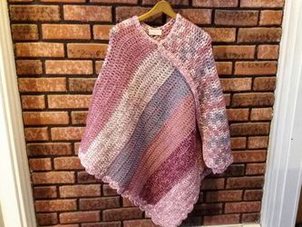 NEW, never used, one of a kind, ladies or teenagers handmade poncho