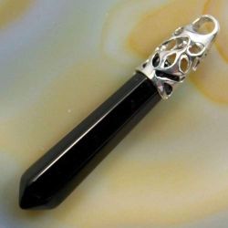 Black onyx gemstone pendant, 2 and 1/2 inches long
