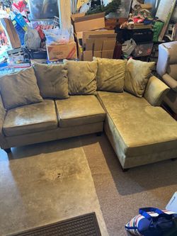 Two piece sectional couch with pillows