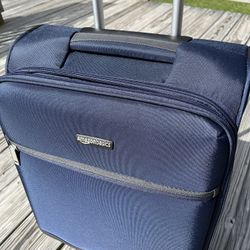 Brand new!!!  Amazon Basics 18.5 Inch Soft Side, Spinner Carry-On, Luggage-Blue