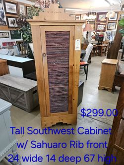 Cabinet Tall S/W Sahuaro rib frontWe are located at 2811 East Bell road. Another Time Around Furniture.