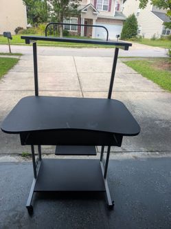 Rolling desk assembly