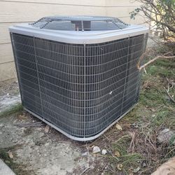 Outdoor A/C Unit. Leaking Condenser